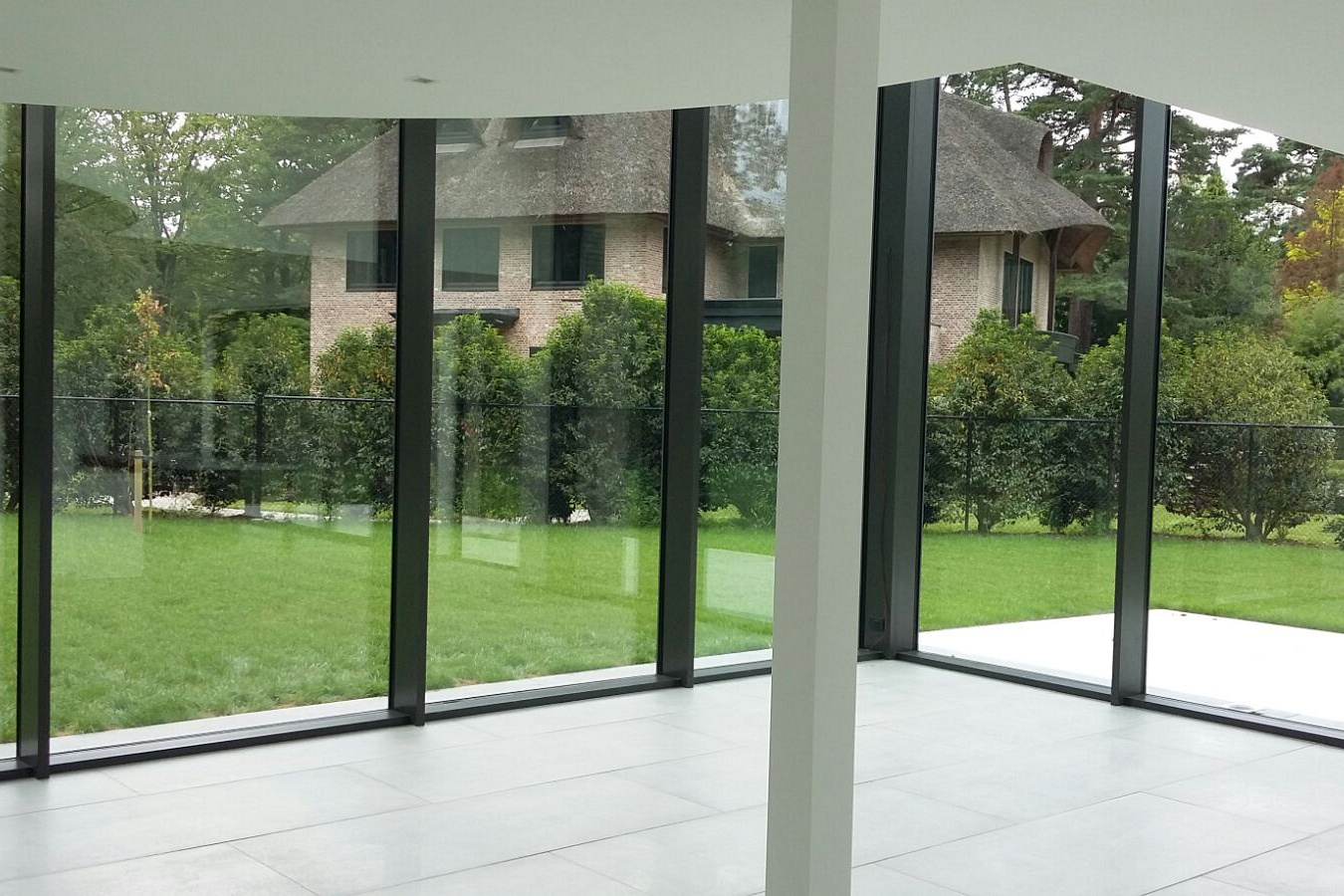 Reinigen van grote glaspartijen Privéwoonst